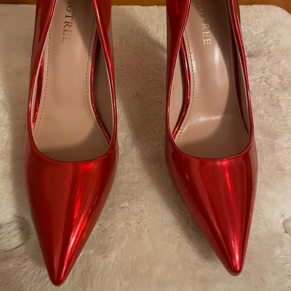 Red shiny High heel shoes